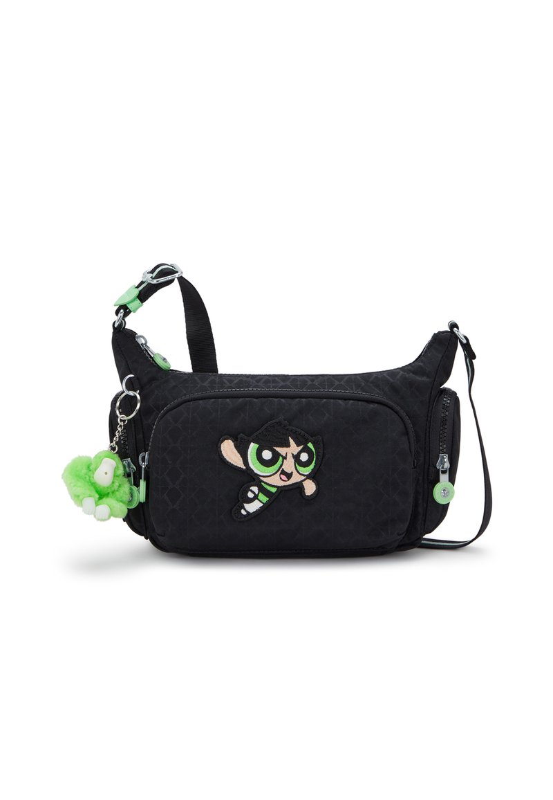 Borsa a mano in tessuto nero con un personaggio ricamato colorato, un portachiavi in peluche verde e una tracolla regolabile con accessori in metallo argentato.