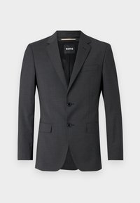 Dunkelgrauer maßgeschneiderter Blazer mit Reverskragen, zwei Knöpfen und zwei Vorderitaschen. Hergestellt aus strukturiertem Stoff und mit einem Etikett im Inneren.