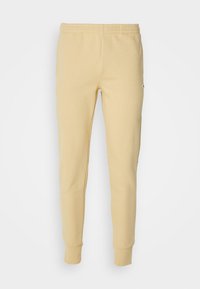 Pantalones deportivos - beige