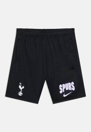 Shorts de sport noirs avec poches latérales, logo Tottenham Hotspur sur la jambe gauche, et texte ""SPURS"" avec le logo Nike sur la jambe droite.