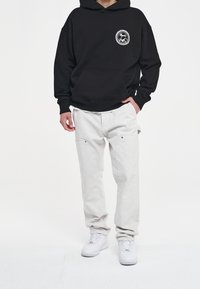 Pegador Luvtröja - black