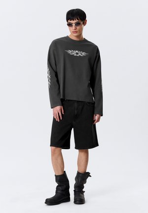 Rank 3: Weekday - GREAT BOXY GRAPHIC LONG SLEEVE - Long sleeved top