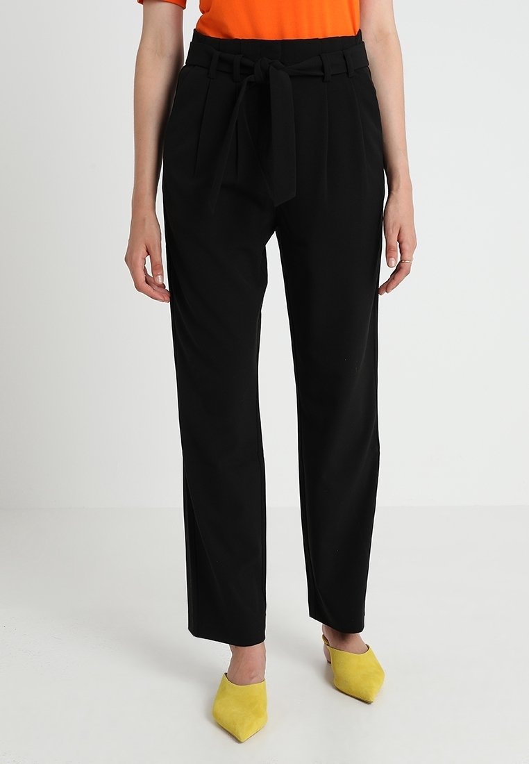 KIOMI Tygbyxor - black