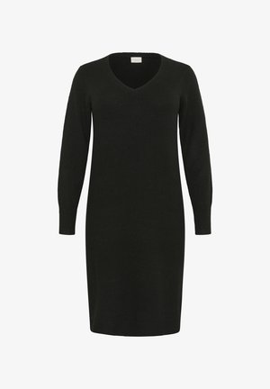 Zwarte gebreide jurk met een V-hals en lange mouwen. De stof lijkt zacht; de silhouet is recht en reikt tot boven de knie.