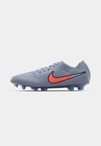 Blue synthetic football boot with textured surface, black accents, and bright orange Nike logo. Features six studs for grip.