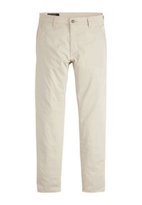 Pantalons en coton beige avec une coupe droite, poches avant et fermeture à bouton. Texture lisse et détails de couture minimaux.