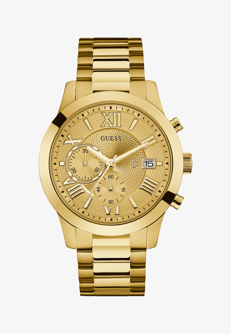 Montre chronographe en or avec un cadran texturé, index horaires en chiffres romains et affichage de la date. Équipée d'un bracelet en métal doré à maillons.