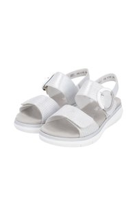 White open-toe sandals with a textured strap and circular buckle, featuring a cushioned insole and a durable white outsole.