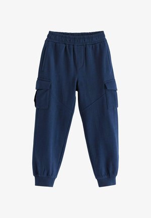 Pantalons de survêtement bleu marine avec une taille élastique, des chevilles fuselées et deux poches cargo latérales. Fabriqués en tissu doux et texturé.