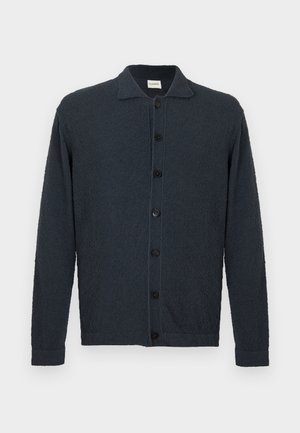 Dark navy blue button-up cardigan with long sleeves, collar, and textured fabric, displayed on a plain white background.