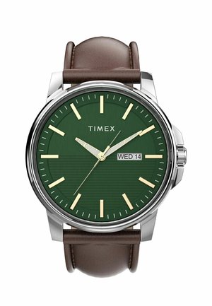 Round Timex wristwatch with green dial, beige hour markers, brown leather strap, and a date window showing Wednesday the 14th.