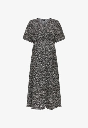 Blommig gravidklänning i svart, med korta ärmar, V-ringning och empire midja. Tillverkad av mjukt tyg med en svävande silhuett.