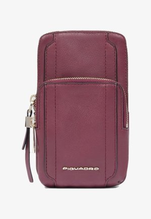 Burgundy leather smartphone wallet with gold hardware, featuring a front zip pocket, stitching accents, and embossed brand logo.