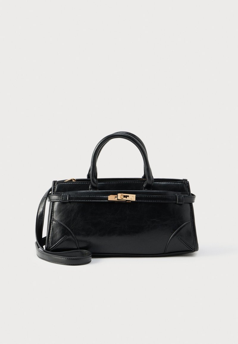 Black leather handbag with a structured shape, dual handles, detachable shoulder strap, and a gold-toned hardware clasp. Textured finish.
