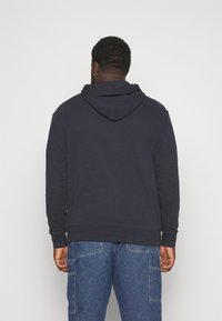 Calvin Klein HERO LOGO COMFORT HOODIE - Sudadera - night sky