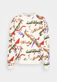 Sudadera de cuello redondo en color crema con un patrón abstracto que presenta formas en rojo, marrón, verde y morado. Tejido suave con puños y dobladillo acanalados.
