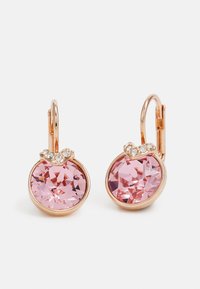 Rose gold earrings with large pink faceted stones, adorned with a small clear crystal accent above, featuring a hinged clasp design.