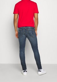 Tommy Jeans Vaqueros pitillo - dark-blue denim