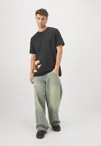 adidas Performance TRAE TEE - Marškinėliai su spaudiniu - black