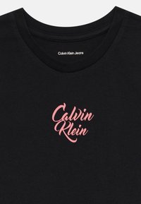 Calvin Klein Jeans SCRIPT LOGO GRAPHIC - Basic T-shirt - black