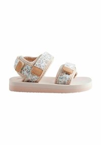 Helle rosa Sandale mit floral gemusterten Riemen, verstellbaren Klettverschlüssen und einer glatten Gummisohle. Strukturelle Akzente am Riemen.
