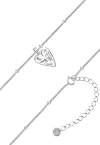 Sudraba ķēdes aproce ar sirds formas piekariņu ar teksturētu dizainu. Aizdarei ir regulējama ķēde ar apaļu tagu.