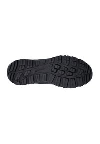 Semelle de chaussure en caoutchouc noir avec des crampons profonds, une surface texturée, et un logo Michelin embossé près du centre pour la traction et la durabilité.