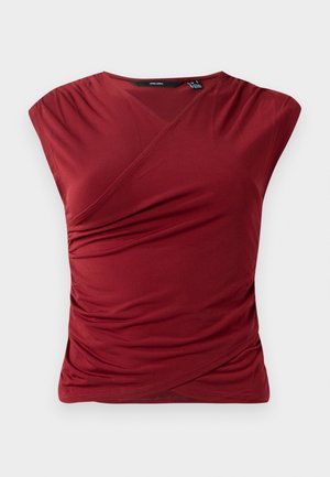 Red short-sleeve top with a wrap design, featuring gathered texture on the side and a smooth, soft fabric finish.
