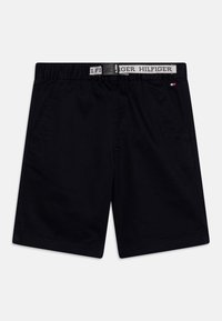 Černé šortky vyrobené z bavlny s jemnou texturou, s elastickým pasem a značkovým pásem na vrchní části.