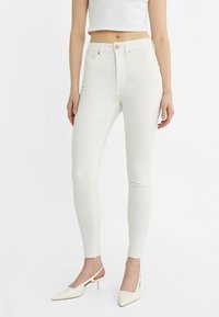 Stradivarius REGULAR WAIST - Uske traperice - white