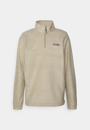 Beige fleecetruien met een halve ritskraag, lange mouwen en een platte borstzak met een klein logo. Zachte textuur en eenvoudig ontwerp.