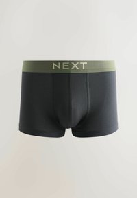 Boxers noirs pour hommes avec une ceinture élastique olive ornée du logo "NEXT" en lettres claires.
