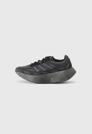 ADIZERO ARUKU UNISEX - Sneaker low - core black/carbon/iron
