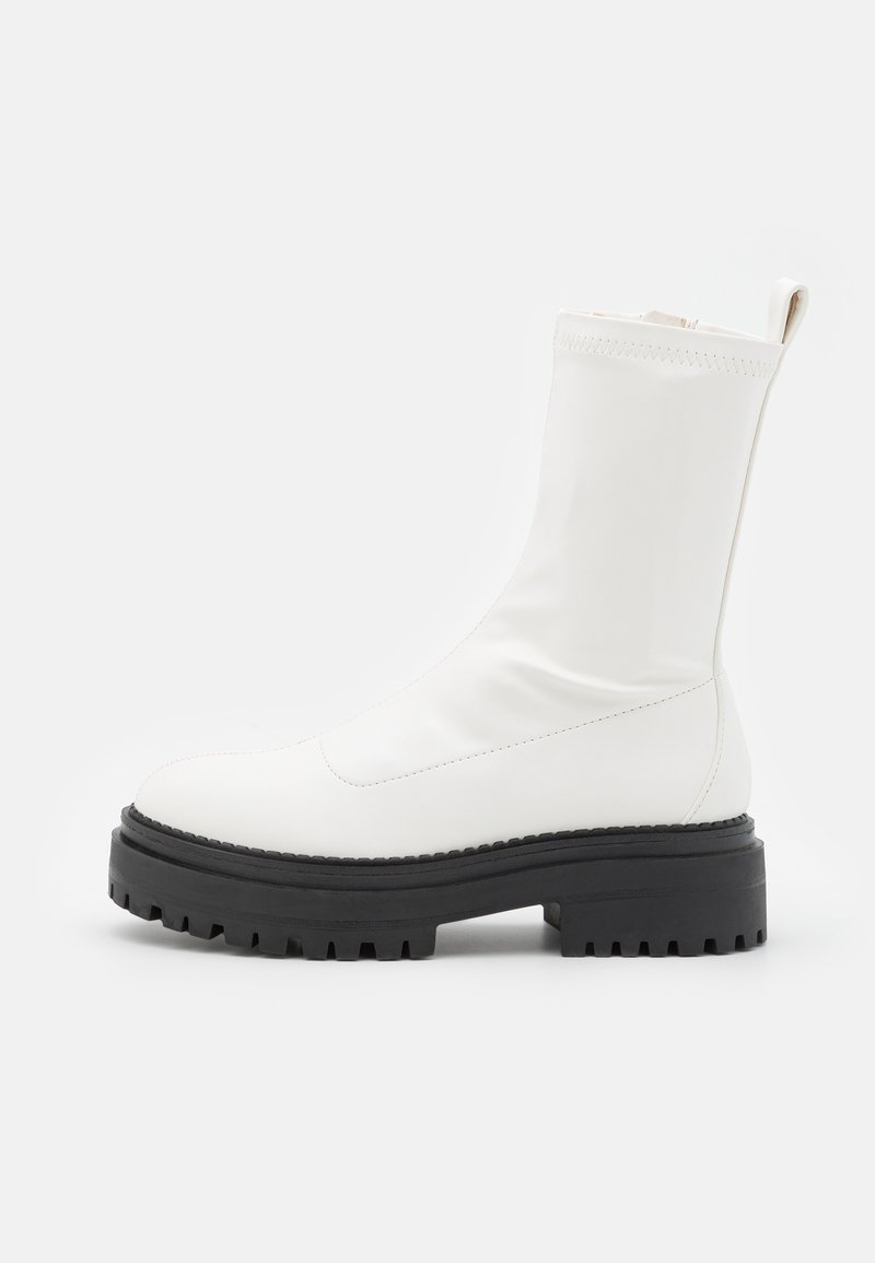 Raid Enkellaarsjes met plateauzool wit Raid Enkellaarsjes met plateauzool wit