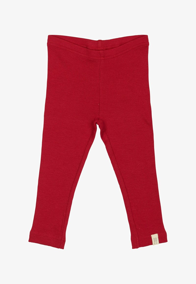 Leggings rojos acanalados con cintura elástica, con una pequeña etiqueta en el dobladillo. La tela tiene un acabado suave y texturizado.