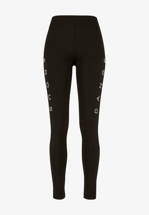 Schwarze Leggings aus dehnbarem Material mit vertikalem weißen Text "DANGEROUS" an den Seiten. Glatte Textur und figurnahe Passform.