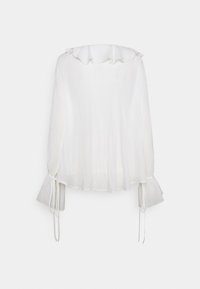 Blusa bianca plissettata con scollo arricciato, maniche lunghe e polsini legati. Il tessuto appare leggero e liscio, creando una silhouette fluida.
