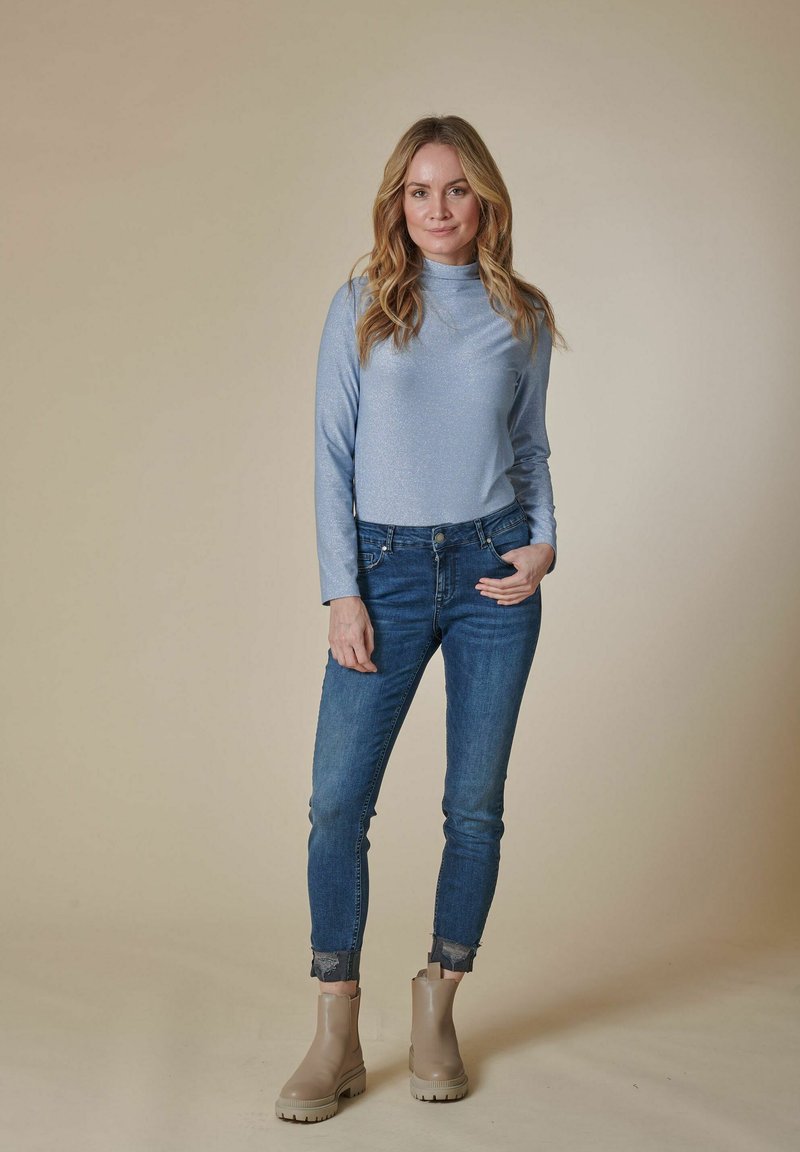 Blaue Jeans Stiefeletten Outfit Jeans Zhrill Jeans Slim Fit Blue