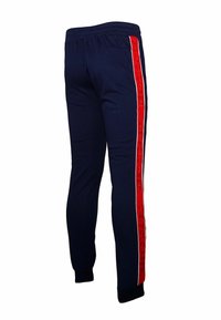 Navy blue jogger pants with red side stripes, featuring the text "U.S. POLO ASSN." on the stripes. Elastic waistband and cuffs.