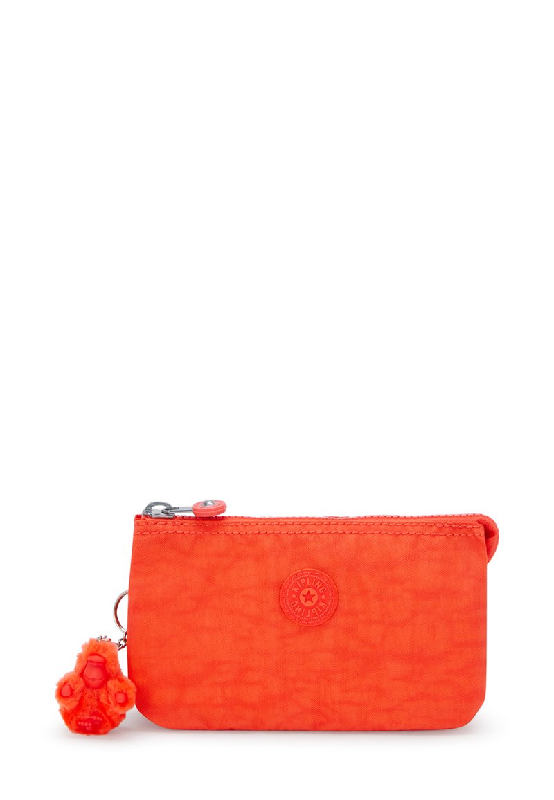 Bright orange zippered pouch made of textured fabric. Features a round logo and a small plush monkey keychain attached.