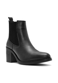 Stivale alla caviglia in pelle nera con lati elastici, tacco a blocco, punta arrotondata e linguetta. Texture liscia con un design elegante e sobrio.