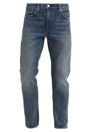 Blaue Denim-Jeans mit klassischem Fünf-Taschen-Design und Knopfverschluss, die eine gerade Beinpassform und leicht ausgebleichte Details zeigen.