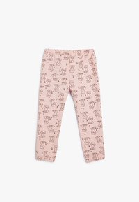 Rosa Leggings aus weichem Stoff mit einem wiederholten Muster aus liniengezeichneten Katzen. Elastischer Bund und geraffte Knöchelabschlüsse.
