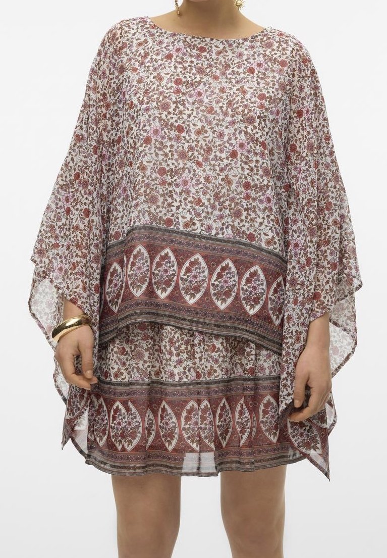 Kafran à motif floral en tissu transparent, avec une coupe ample, un col rond et un ourlet à couches avec une bordure contrastante et des couleurs accentuées.