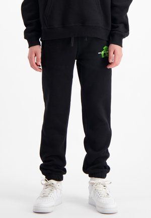 ACTION FIGURE  - Tracksuit bottoms - black