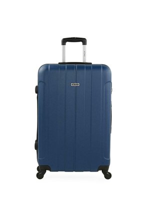 Maleta rígida navy con ranuras verticales, asa retráctil, ruedas dobles y cerradura, que cuenta con una superficie texturizada para un mejor agarre.