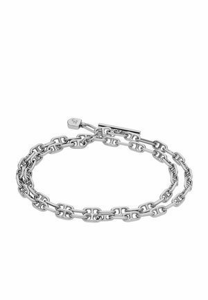 Silberne Kettenarmband mit ineinandergreifenden ovalen Gliedern, einem Toggle-Verschluss und einem kleinen Schild mit eingeprägtem Branding. Glatte, polierte Oberfläche.