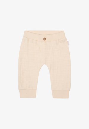 Pantalon en coton beige clair avec une ceinture côtelée, détail de bouton et poches latérales, au design de tissu texturé et doux.