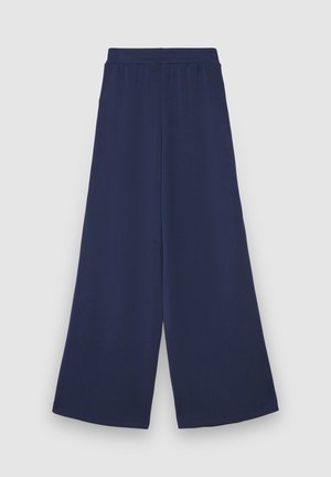 Marineblaue Hose mit weitem Bein und elastischem Bund, hergestellt aus weichem Stoff. Verfügt über eine lockere Passform und einen sauberen, schmucklosen Saum.
