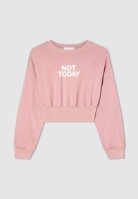 Felpa corta rosa con maniche lunghe, caratterizzata da una scritta bianca "NOT TODAY" sul davanti. Tessuto morbido con vita e polsini a coste.